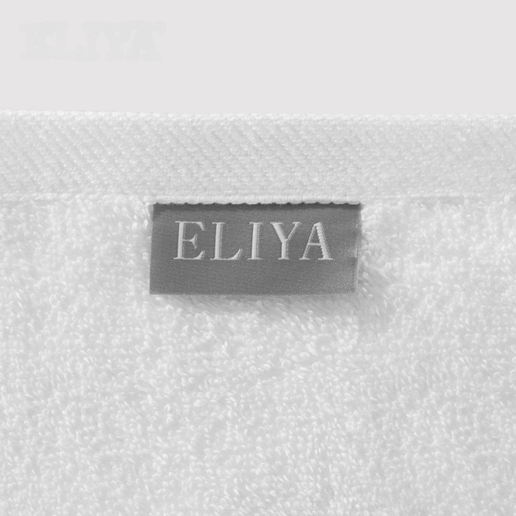 La toalla del hotel fija el blanco puro del algodón con la armadura llana clásica para el mercado internacional