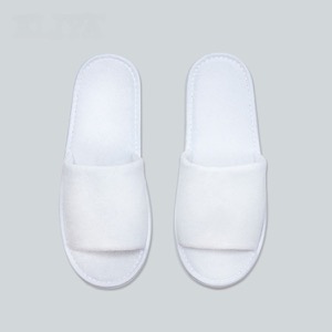 Pantuflas blancas desechables para habitación de hotel de lujo