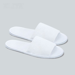 Pantuflas blancas desechables para habitación de hotel de lujo