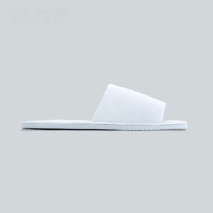 Pantuflas blancas desechables para habitación de hotel de lujo