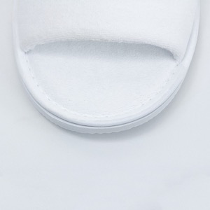 Pantuflas blancas desechables para habitación de hotel de lujo