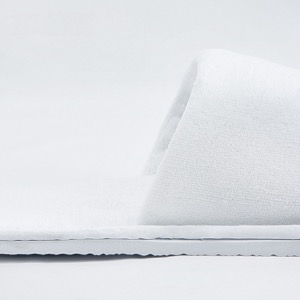 Pantuflas blancas desechables para habitación de hotel de lujo