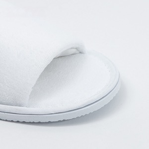 Pantuflas blancas desechables para habitación de hotel de lujo
