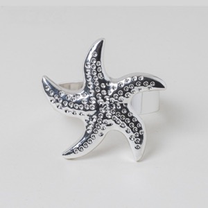 Servilletero de metal con forma de estrella de mar