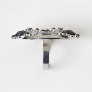 Anillo de servilleta de pavo real de cristal destrozado